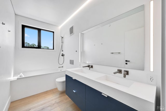 4966 Lakepointe Cir, Santa Rosa, CA 95403 - full bath with toilet, double vanity, wood finished floors, and shower / bathtub combination