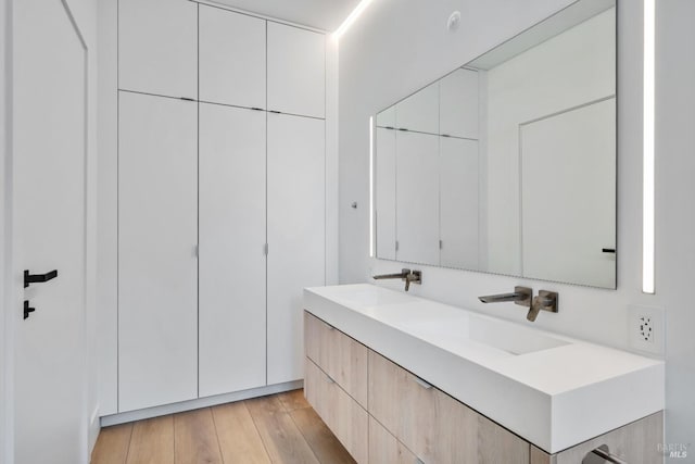 4966 Lakepointe Cir, Santa Rosa, CA 95403 - bathroom featuring double vanity and wood finished floors