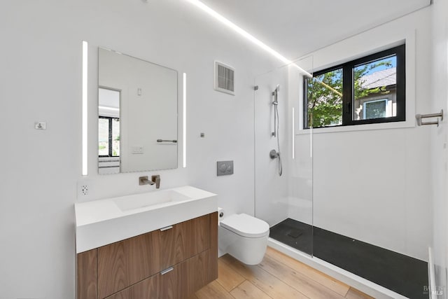 4966 Lakepointe Cir, Santa Rosa, CA 95403 - full bathroom featuring toilet, walk in shower, vanity, and wood finished floors