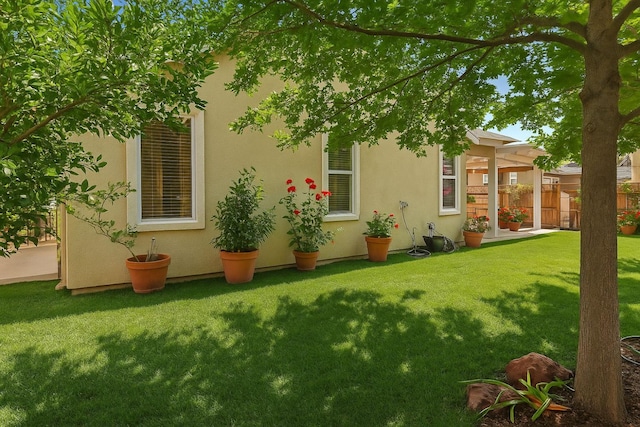 2032 Hunt St, Woodland, CA 95776 - rear view of house featuring stucco siding