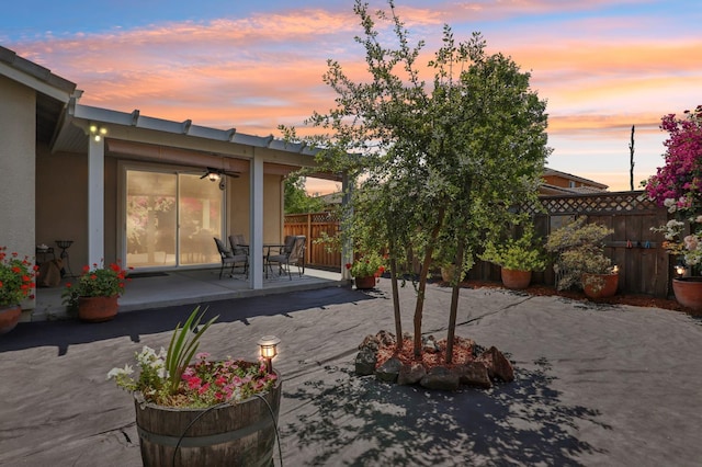 2032 Hunt St, Woodland, CA 95776 - rear view of property with a patio area, a fenced backyard, and stucco siding