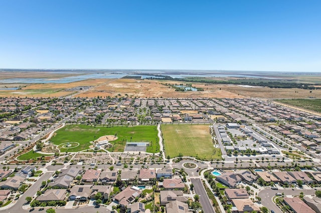 2032 Hunt St, Woodland, CA 95776 - aerial overview of property's location with nearby suburban area and a nearby body of water