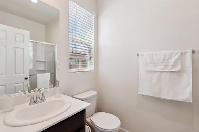2032 Hunt St, Woodland, CA 95776 - full bath featuring an enclosed shower, toilet, and vanity