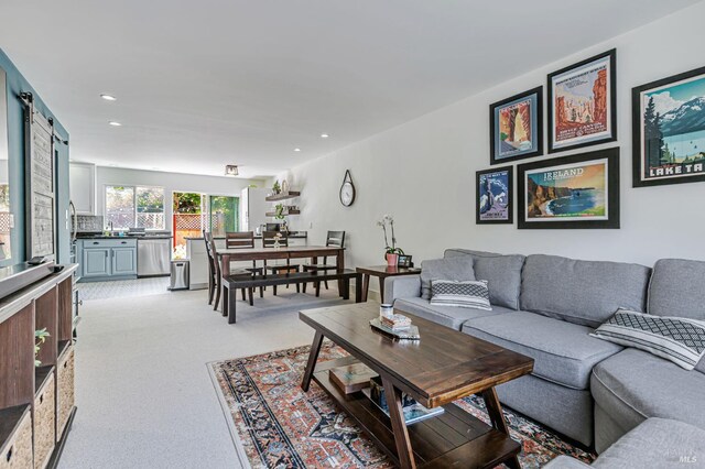 3 Aries Ln, Novato, CA 94947 - living room with light colored carpet, recessed lighting, and a barn door