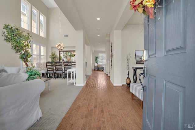 116 Birmingham Ct, Discovery Bay, CA 94505 - foyer entrance featuring a chandelier, wood finished floors, a towering ceiling, recessed lighting, and baseboards