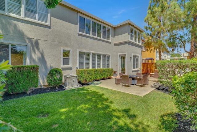 116 Birmingham Ct, Discovery Bay, CA 94505 - back of house with a patio, stucco siding, central AC, and a yard
