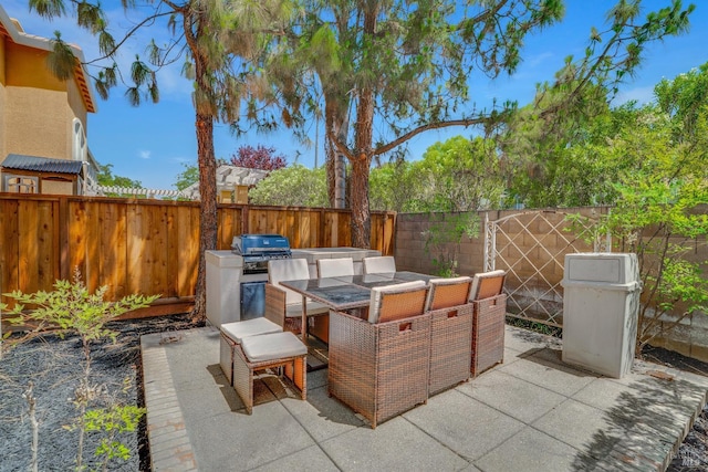 116 Birmingham Ct, Discovery Bay, CA 94505 - fenced backyard with area for grilling, a patio area, and outdoor dining space