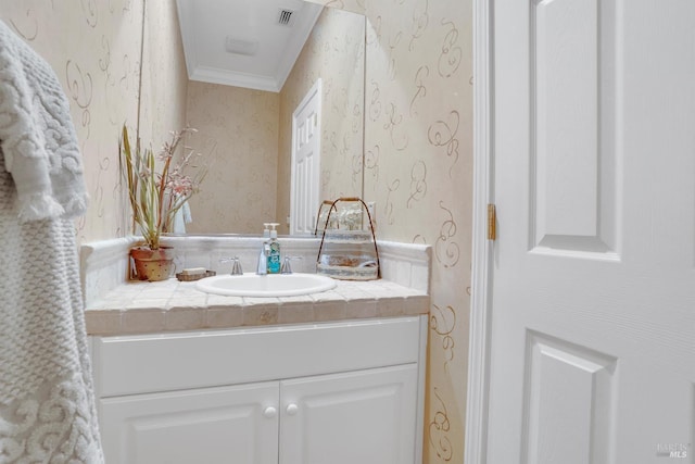 116 Birmingham Ct, Discovery Bay, CA 94505 - bathroom featuring wallpapered walls, vanity, and ornamental molding
