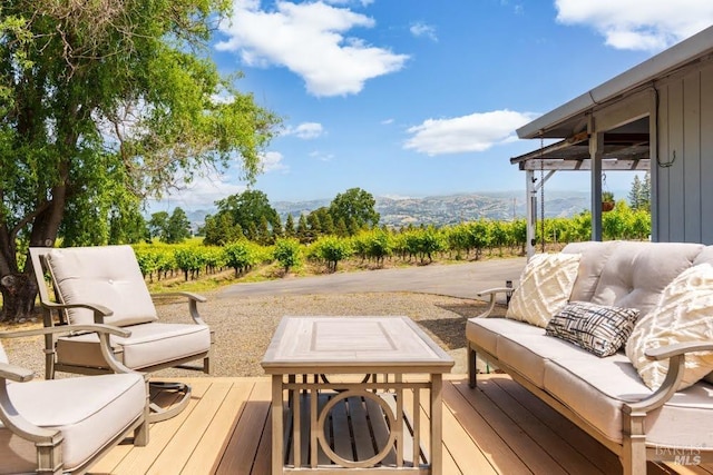 725 Lytton Station Rd, Healdsburg, CA 95448 - wooden terrace with an outdoor hangout area and a mountain view