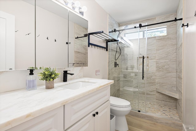 725 Lytton Station Rd, Healdsburg, CA 95448 - bathroom featuring vanity, toilet, a stall shower, and wood finished floors