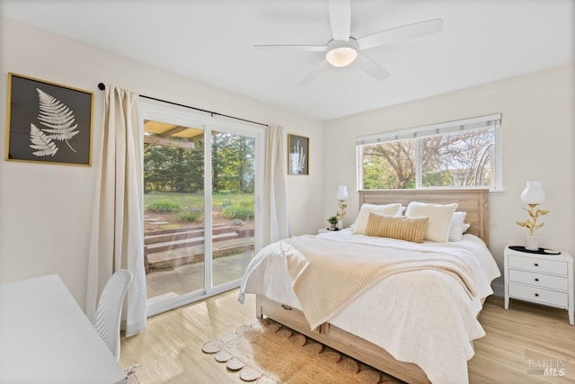 725 Lytton Station Rd, Healdsburg, CA 95448 - bedroom with access to exterior, multiple windows, light wood finished floors, and a ceiling fan