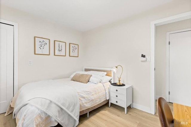725 Lytton Station Rd, Healdsburg, CA 95448 - bedroom featuring light wood finished floors and baseboards