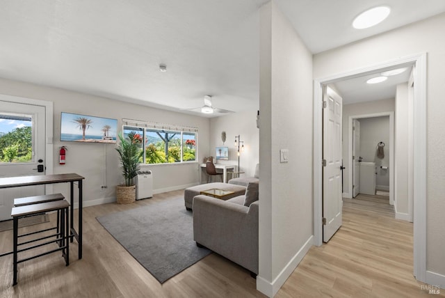 725 Lytton Station Rd, Healdsburg, CA 95448 - living room with light wood-type flooring, baseboards, and ceiling fan