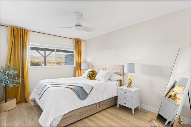 725 Lytton Station Rd, Healdsburg, CA 95448 - bedroom with light wood-style floors, baseboards, and ceiling fan