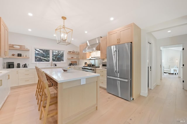 20 Almenar Dr, Greenbrae, CA 94904 - kitchen with stainless steel appliances, open shelves, wall chimney range hood, light brown cabinetry, and recessed lighting