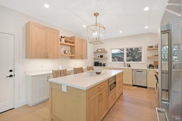 20 Almenar Dr, Greenbrae, CA 94904 - kitchen with open shelves, appliances with stainless steel finishes, light brown cabinets, light wood-style flooring, and light countertops