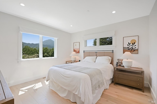 20 Almenar Dr, Greenbrae, CA 94904 - bedroom featuring light wood-style flooring, recessed lighting, baseboards, and a mountain view