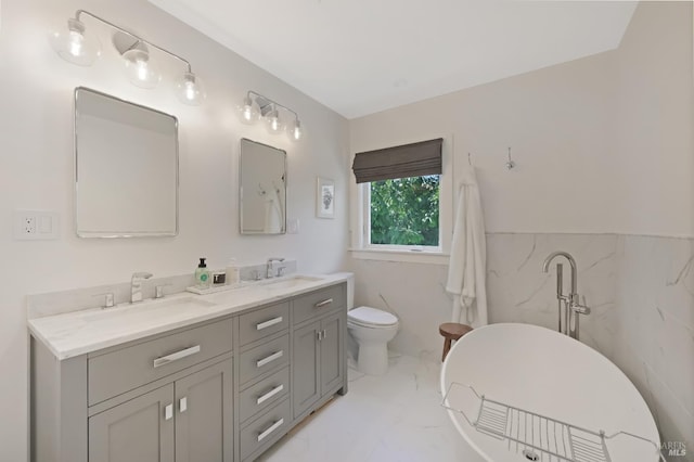 20 Almenar Dr, Greenbrae, CA 94904 - full bathroom featuring marble look tiles, double vanity, toilet, and a soaking tub