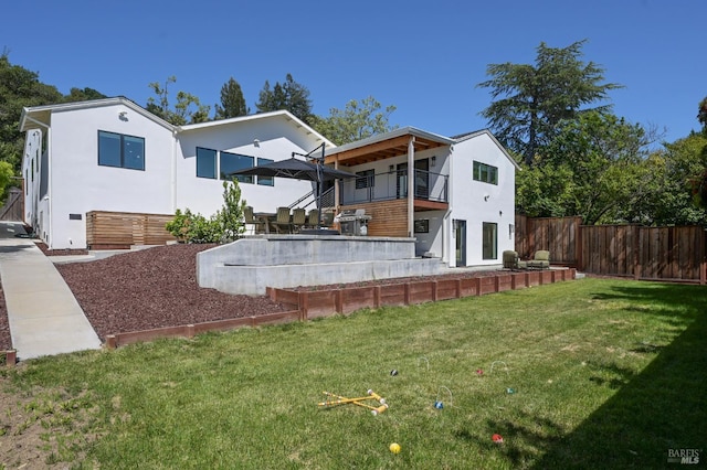 20 Almenar Dr, Greenbrae, CA 94904 - rear view of house with stucco siding, stairs, a patio area, and a balcony