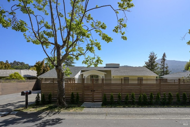 20 Almenar Dr, Greenbrae, CA 94904 - view of front of property featuring a fenced front yard and roof with shingles