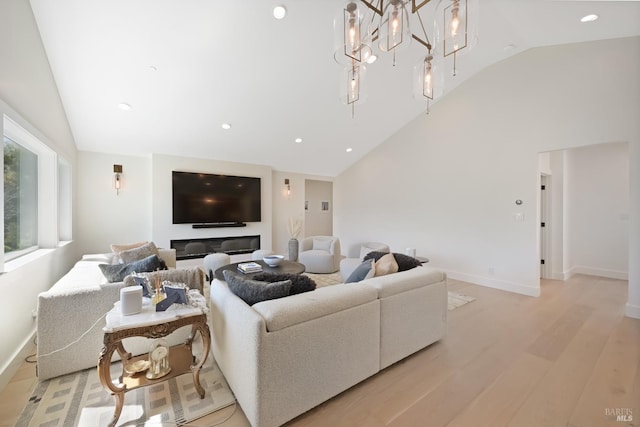 20 Almenar Dr, Greenbrae, CA 94904 - living area with light wood finished floors, high vaulted ceiling, recessed lighting, and baseboards