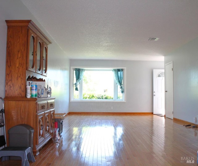 1863 Mini Dr, Vallejo, CA 94589 - living room with hardwood / wood-style flooring and baseboards