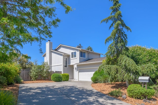 1721 Northstar Dr, Petaluma, CA 94954 - view of front of house with concrete driveway, a chimney, and a garage