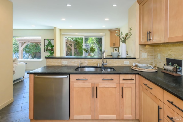 1721 Northstar Dr, Petaluma, CA 94954 - kitchen featuring stainless steel dishwasher, a sink, dark stone counters, light brown cabinets, and recessed lighting