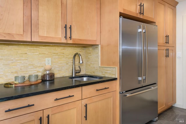 1721 Northstar Dr, Petaluma, CA 94954 - kitchen with stainless steel refrigerator, a sink, light brown cabinetry, tasteful backsplash, and dark stone countertops