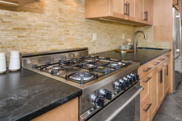 1721 Northstar Dr, Petaluma, CA 94954 - kitchen with appliances with stainless steel finishes, a sink, backsplash, and dark countertops
