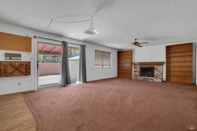 4009 Rimrock Dr, Antioch, CA 94509 - unfurnished living room featuring ceiling fan, a textured ceiling, and a brick fireplace