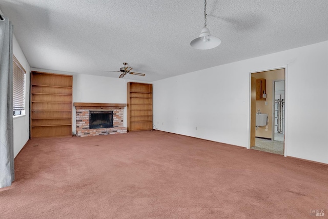 4009 Rimrock Dr, Antioch, CA 94509 - unfurnished living room featuring a textured ceiling, a ceiling fan, a brick fireplace, and carpet