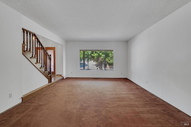 4009 Rimrock Dr, Antioch, CA 94509 - spare room with carpet, a textured ceiling, and stairway