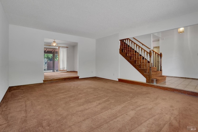 4009 Rimrock Dr, Antioch, CA 94509 - unfurnished living room featuring carpet floors, stairs, a textured ceiling, and ceiling fan