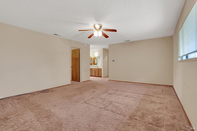4009 Rimrock Dr, Antioch, CA 94509 - empty room with ceiling fan, light colored carpet, and a textured ceiling