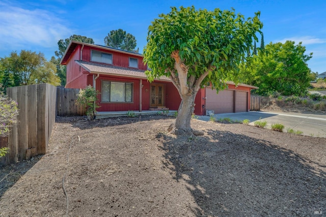 4009 Rimrock Dr, Antioch, CA 94509 - view of front of house with concrete driveway, an attached garage, and french doors