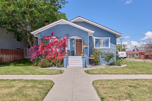 46 N 4th St, Rio Vista, CA 94571 - bungalow-style house with stucco siding, a chimney, and a porch