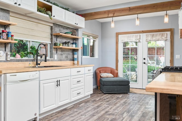 46 N 4th St, Rio Vista, CA 94571 - kitchen with open shelves, white dishwasher, a sink, tasteful backsplash, and beam ceiling