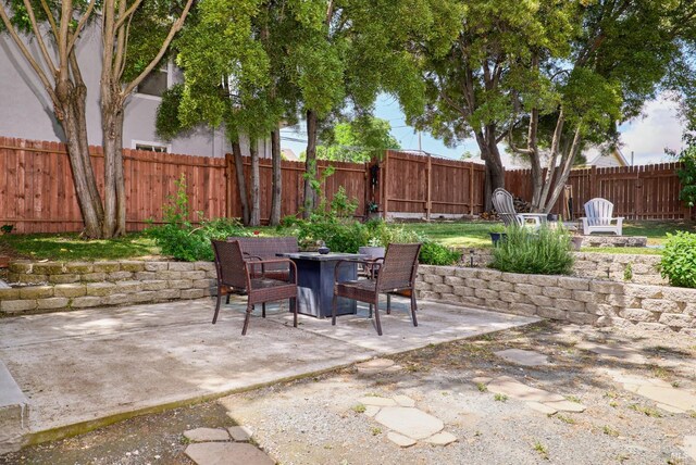 46 N 4th St, Rio Vista, CA 94571 - fenced backyard featuring a patio and outdoor dining area