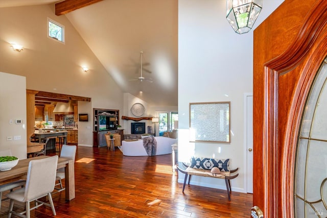466 Pratt Ave, Saint Helena, CA 94574 - dining area with high vaulted ceiling, beamed ceiling, dark wood finished floors, a ceiling fan, and a fireplace with raised hearth