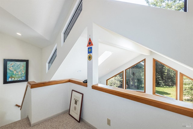 22111 Umland Cir, Jenner, CA 95450 - stairway with carpet, a skylight, vaulted ceiling, and plenty of natural light