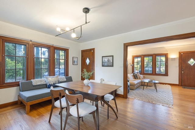 439 4th St E, Sonoma, CA 95476 - dining space with light wood-style flooring, baseboards, plenty of natural light, and ornamental molding