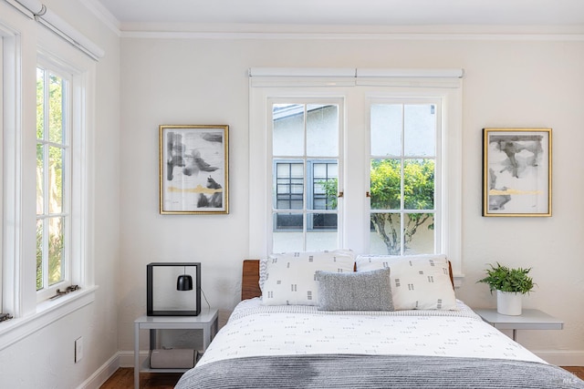 439 4th St E, Sonoma, CA 95476 - bedroom featuring baseboards, crown molding, and wood finished floors
