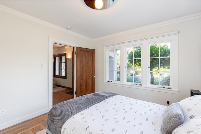 439 4th St E, Sonoma, CA 95476 - bedroom with baseboards, crown molding, and light wood-style flooring