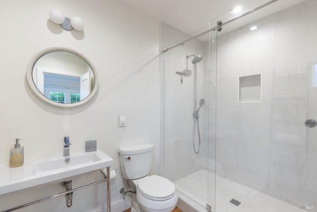 439 4th St E, Sonoma, CA 95476 - bathroom featuring toilet, a shower stall, and a sink