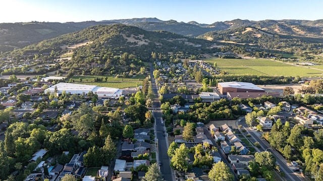 439 4th St E, Sonoma, CA 95476 - aerial overview of property's location featuring a mountainous background and nearby suburban area