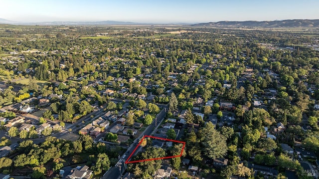 439 4th St E, Sonoma, CA 95476 - aerial overview of property's location featuring property boundaries highlighted and a mountainous background