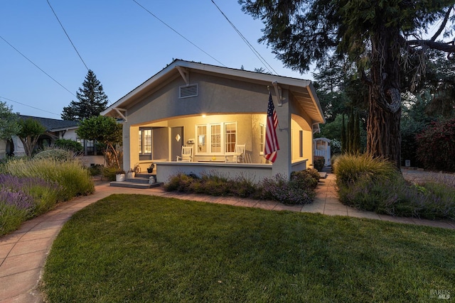 439 4th St E, Sonoma, CA 95476 - bungalow featuring stucco siding, a porch, and a front yard