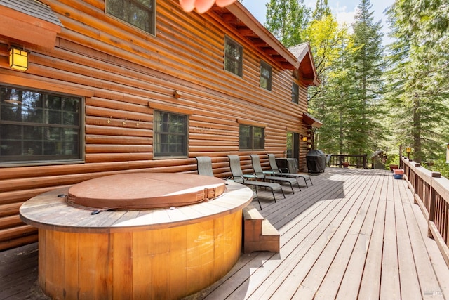 9547 Grassland Ct, Shingletown, CA 96088 - wooden terrace featuring a hot tub and grilling area