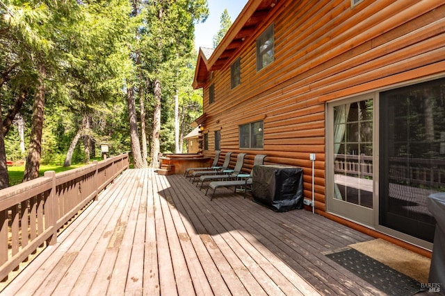 9547 Grassland Ct, Shingletown, CA 96088 - wooden terrace with a covered hot tub